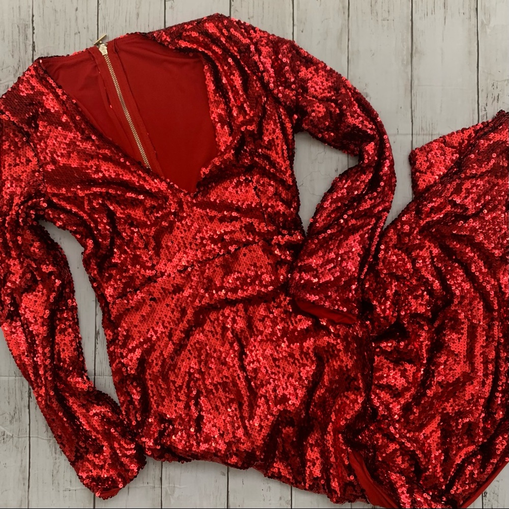 Sequined plunge Vneck line long sleeved gown side leg slit